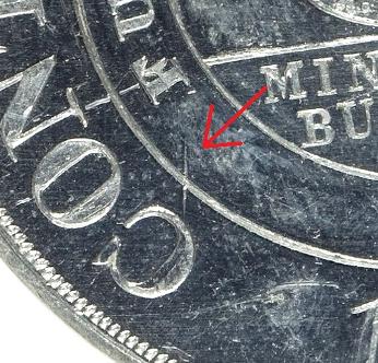 Die crack found on all post-1876 issues of Dickesons Continental Currency Dollar
