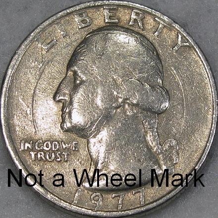 DM Rare Coins photography service demonstrates a wheel mark versus a rolling machine scratch on Washington quarters and Franklin half dollars.