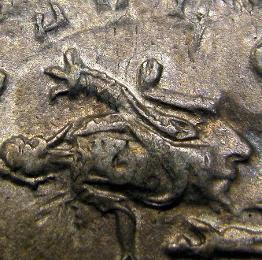 Gordian III denarius appears beneath Herrenia Etruscilla Antoninianus. Image courtesy DM Rare Coins coin photography service.